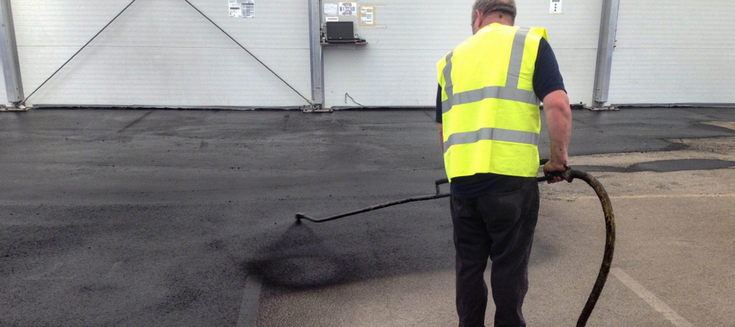 Seal the Deal: Transforming Your Asphalt with Expert Seal Coating Services